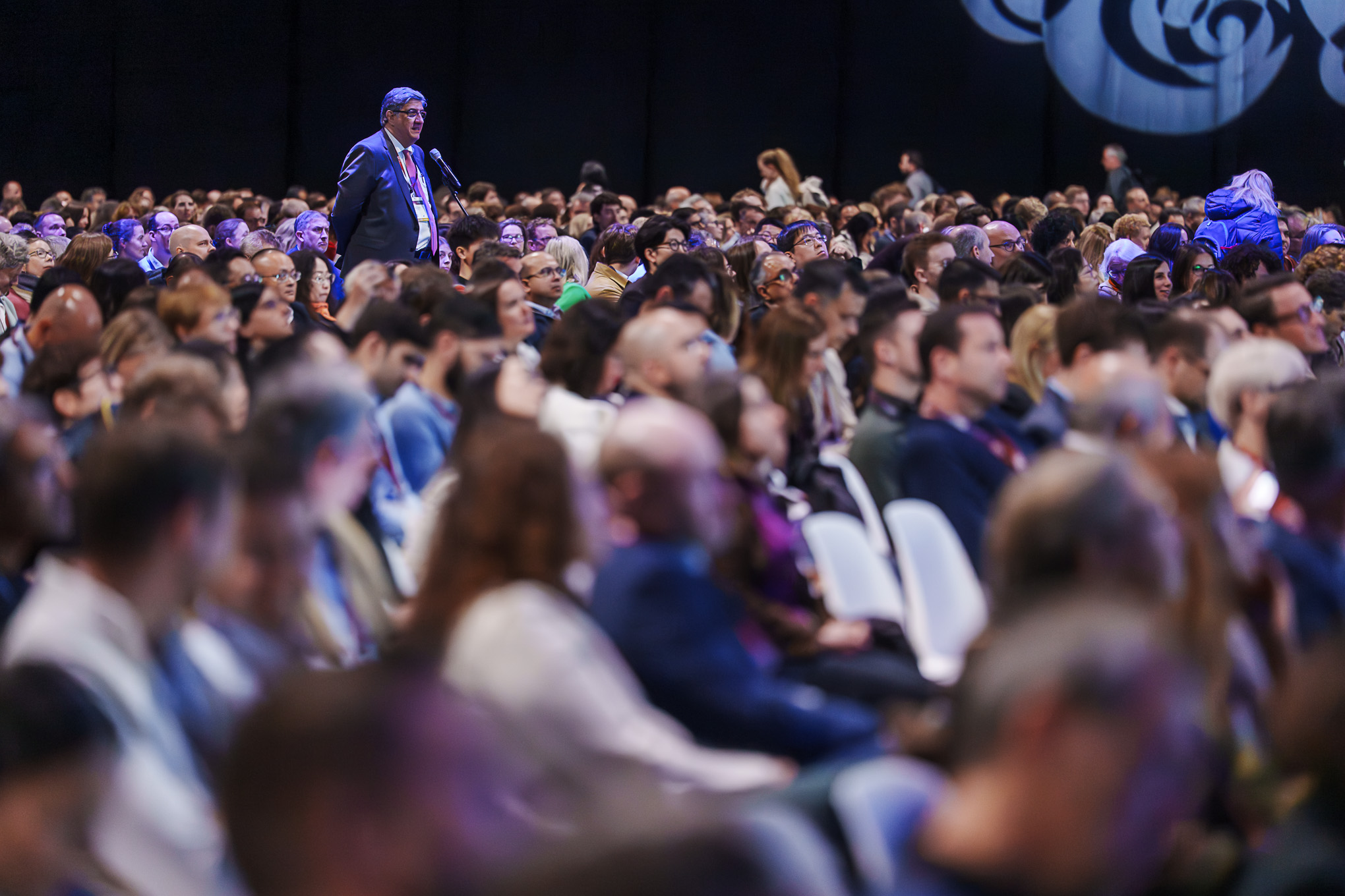 A delegate is asking a question at a session at ESOC 2026
