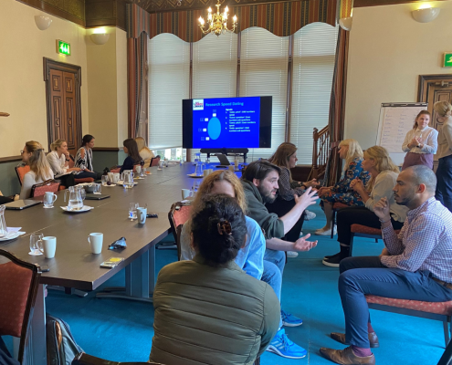 Group of young researchers discussing at ESO Edinburgh Stroke Research Workshop.